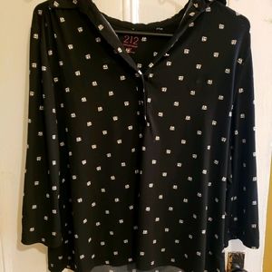 Medium polka dotted dress shirt.